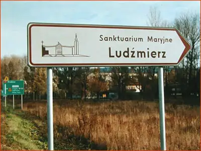 drogowskaz E-10 drogowskaz wskazujący kierunek do miejsca kultu religijnego